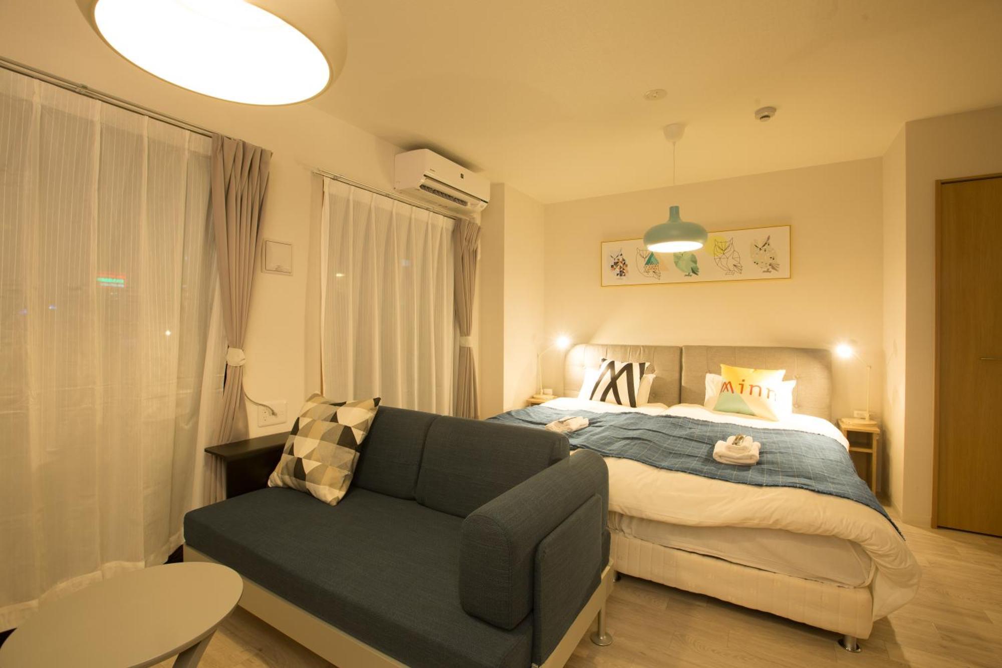 Апартаменти Sky Living Namba Осака Номер фото