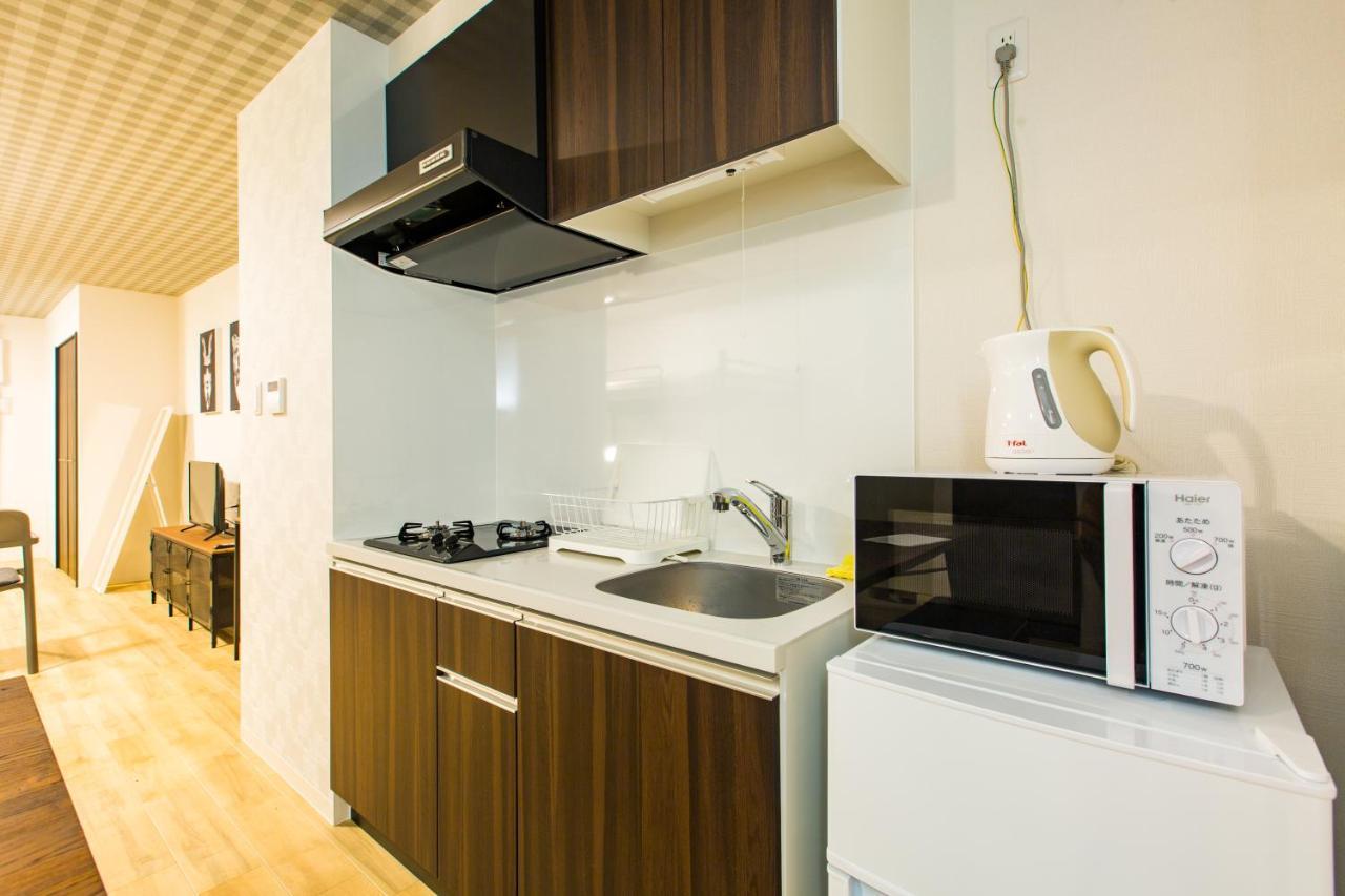 Апартаменти Sky Living Namba Осака Екстер'єр фото